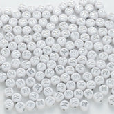 BD00096-02-silver-letter-white-opaque-coin-alphabet-beads-single-m-4×7mm